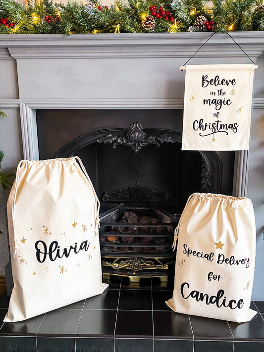 END OF LINE - "Believe in the Magic of Christmas" Black & Gold Glitter Wall Banner