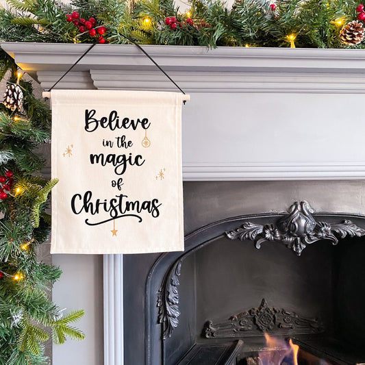 "Believe in the Magic of Christmas" Black & Gold Glitter Wall Banner
